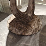 Round Sofa Side Table with Radial Natural Wood Veneer Top Sculptural Loop Pedestal and Circular Base